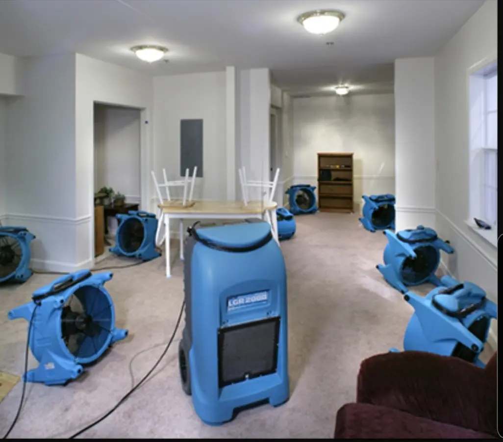 Air movers and dehumidifier setup for Water Damage Restoration in Eudora